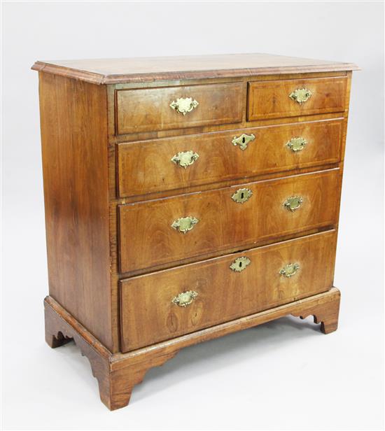 A George II walnut and featherbanded chest, W.3ft 2in.